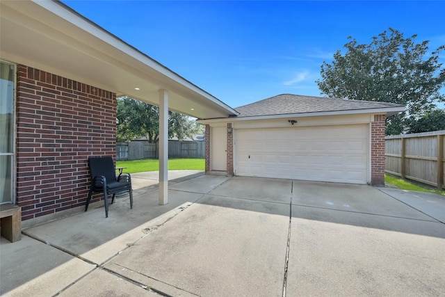 detached garage with fence