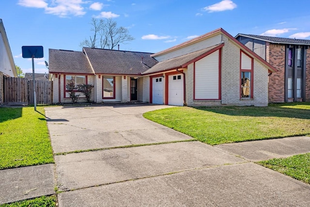 view of front of home featuring fence, driveway, an attached garage, a front lawn, and brick siding