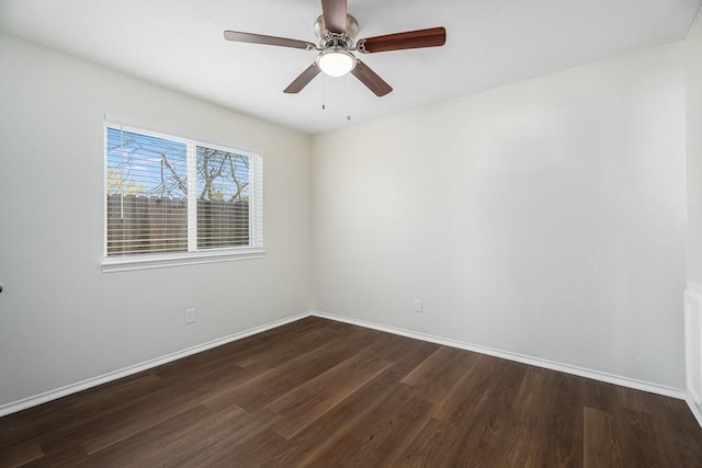 unfurnished room with ceiling fan, baseboards, and wood finished floors