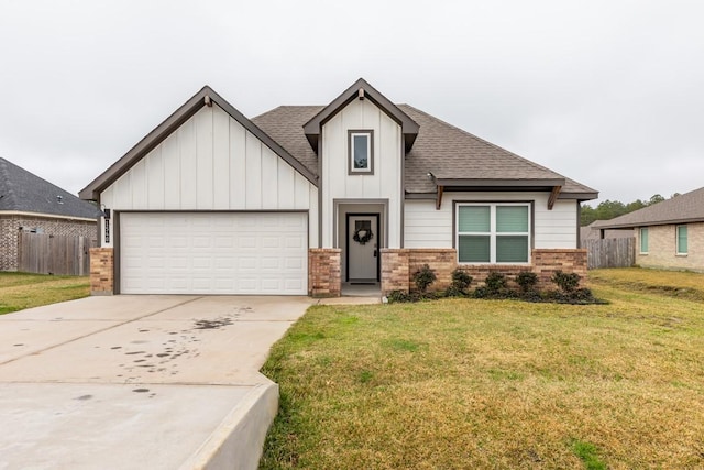 view of front of home with driveway, fence, board and batten siding, a garage, and brick siding