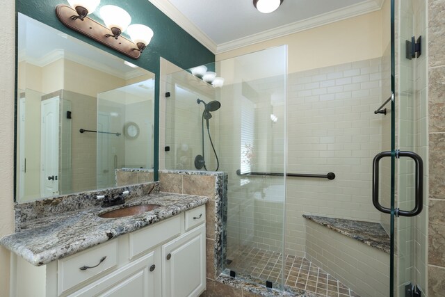 9407 Thurber Ridge Dr, Spring, TX 77379 - full bath featuring ornamental molding, a shower stall, and vanity