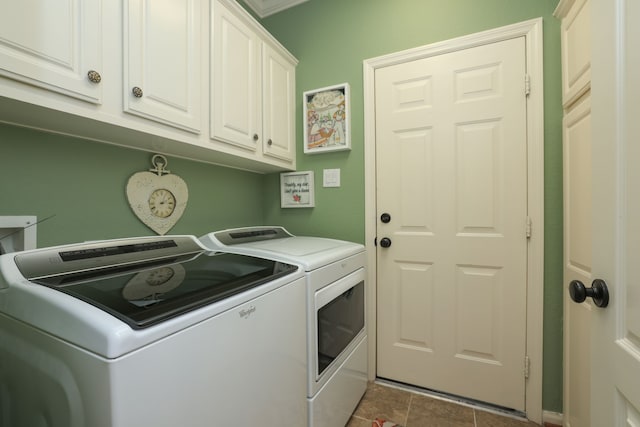 9407 Thurber Ridge Dr, Spring, TX 77379 - laundry room featuring separate washer and dryer and cabinet space