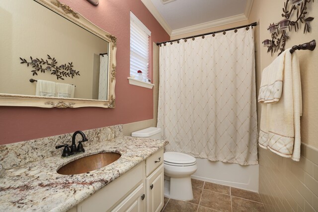 9407 Thurber Ridge Dr, Spring, TX 77379 - bathroom featuring vanity, crown molding, toilet, shower / tub combo with curtain, and tile patterned flooring