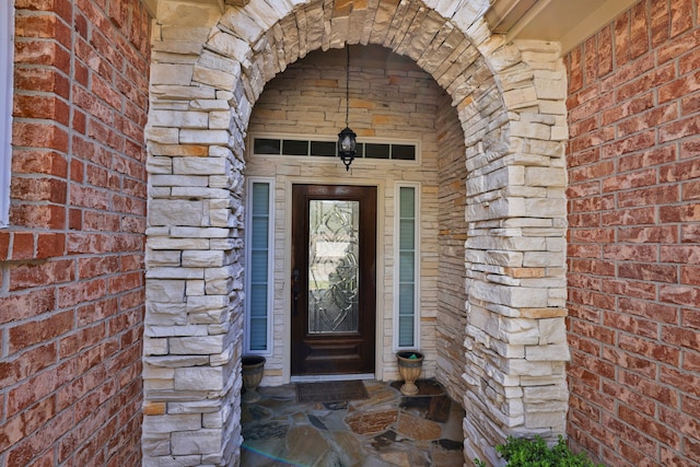 9407 Thurber Ridge Dr, Spring, TX 77379 - property entrance with brick siding and stone siding