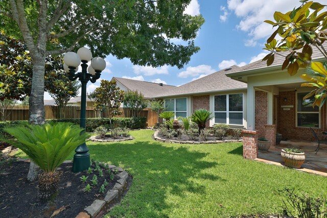 9407 Thurber Ridge Dr, Spring, TX 77379 - view of yard with a patio area
