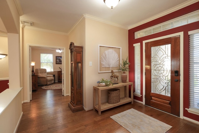 9407 Thurber Ridge Dr, Spring, TX 77379 - entryway featuring crown molding, wood finished floors, and baseboards