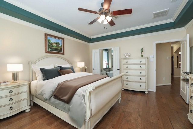9407 Thurber Ridge Dr, Spring, TX 77379 - bedroom with dark wood-style flooring, ornamental molding, a ceiling fan, and baseboards