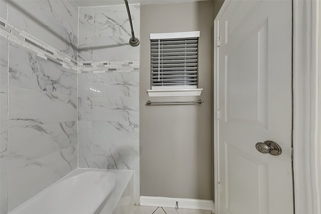 full bathroom featuring baseboards and  shower combination