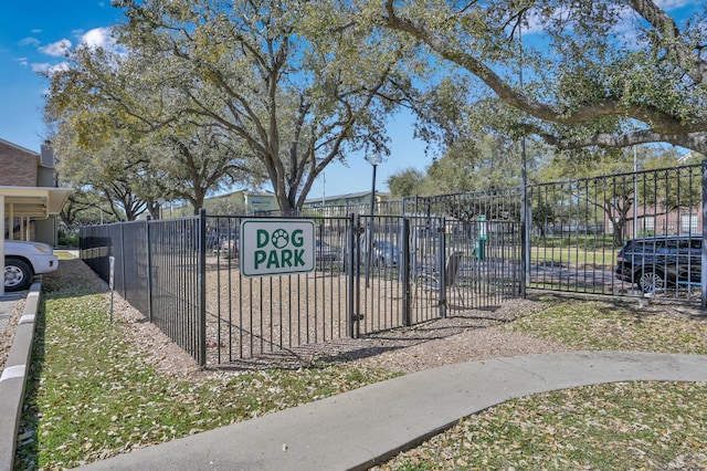 view of gate featuring fence