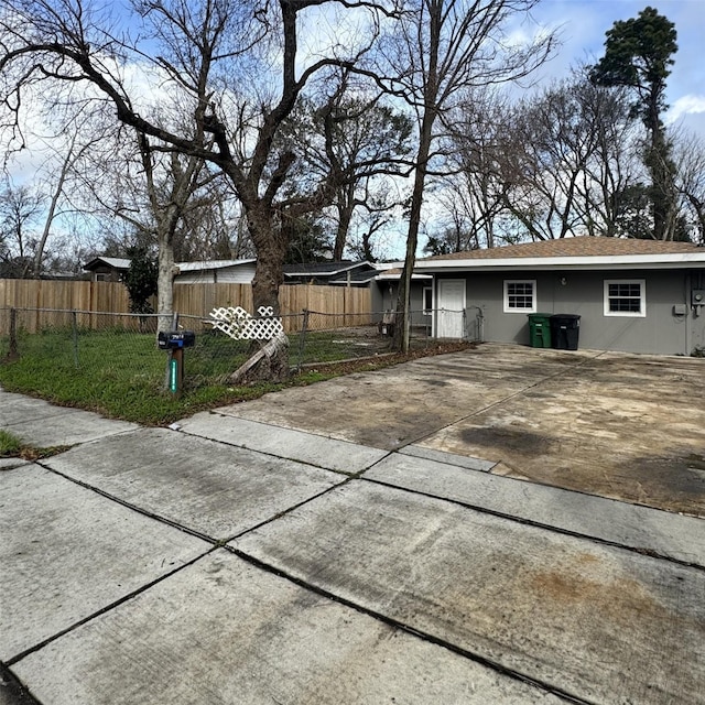 back of property with fence