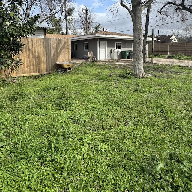 view of yard with fence