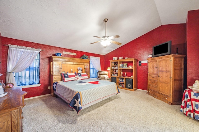 bedroom with carpet flooring, baseboards, and vaulted ceiling