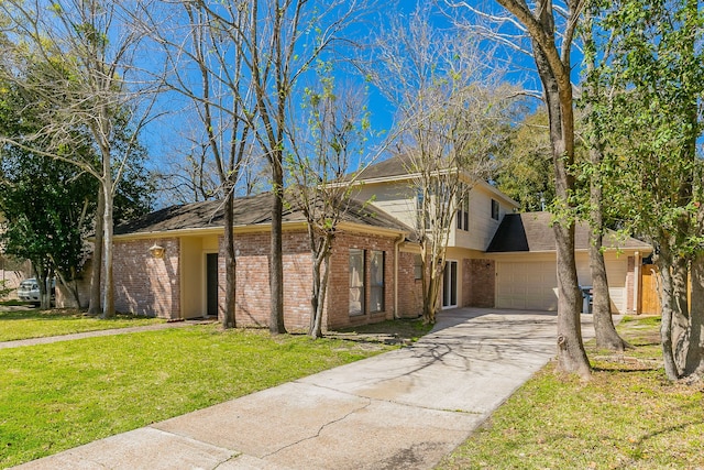 view of front facade featuring brick siding, concrete driveway, a front yard, and a garage