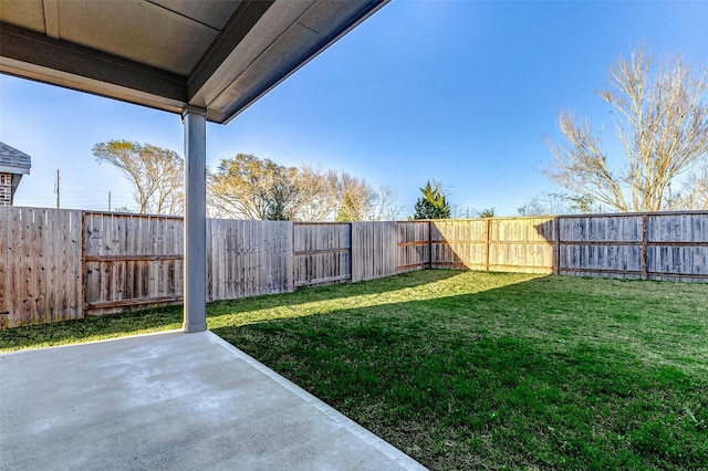 view of yard featuring a patio and a fenced backyard