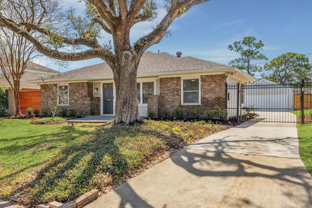 ranch-style house featuring brick siding, a front lawn, a gate, and fence