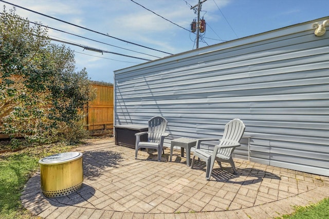 view of patio / terrace featuring fence