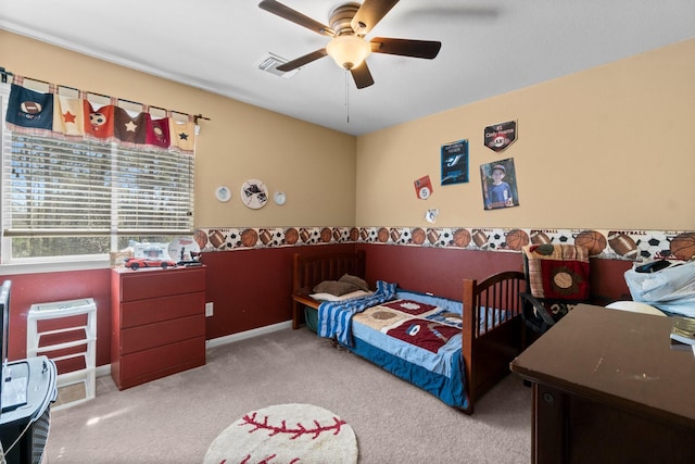 bedroom with visible vents, baseboards, carpet, and ceiling fan