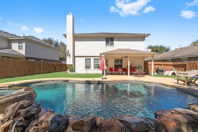 view of pool featuring a fenced in pool, a patio, and a fenced backyard