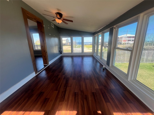 unfurnished sunroom featuring lofted ceiling and ceiling fan