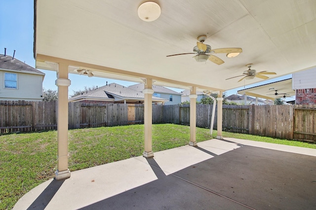 view of patio featuring a fenced backyard and ceiling fan