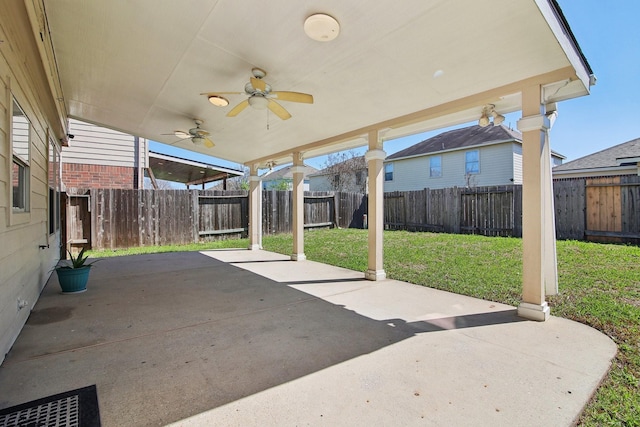 view of patio / terrace with a ceiling fan and a fenced backyard