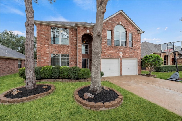 view of front facade with brick siding, an attached garage, concrete driveway, and a front yard