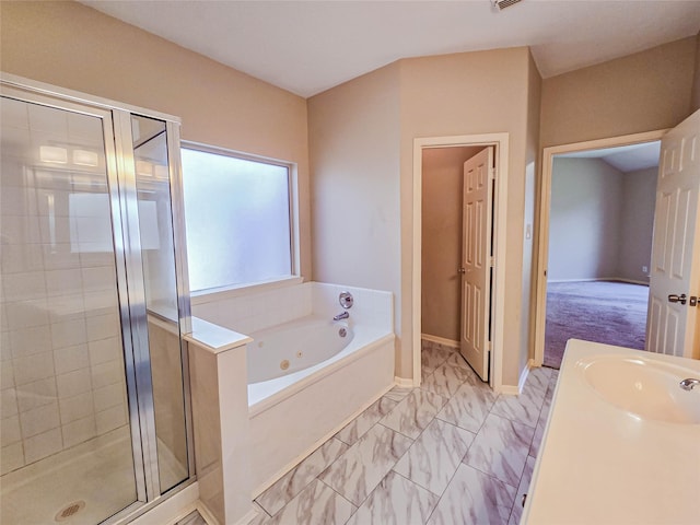 full bath featuring baseboards, marble finish floor, a tub with jets, and a stall shower