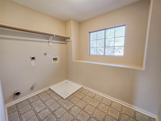 clothes washing area with laundry area, light floors, electric dryer hookup, and hookup for a gas dryer