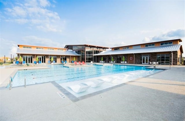 pool featuring a patio area