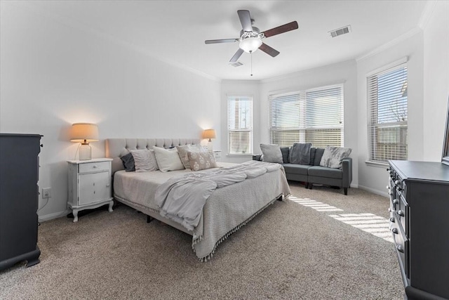 bedroom with multiple windows, light colored carpet, and ornamental molding