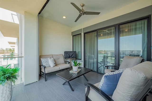 balcony featuring outdoor lounge area and ceiling fan