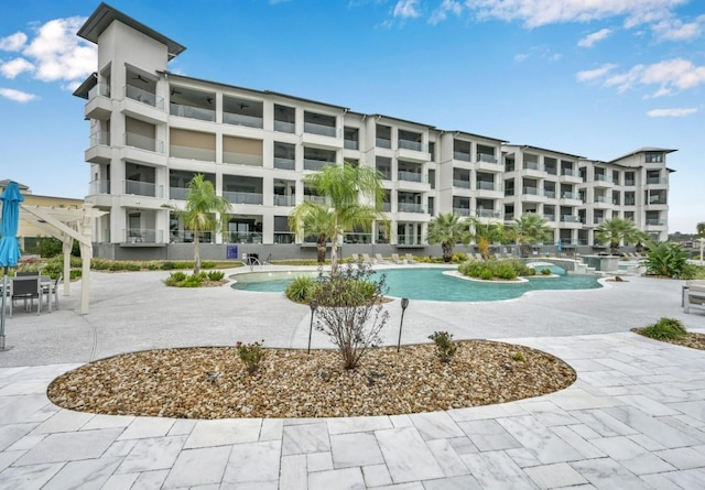 community pool with a patio