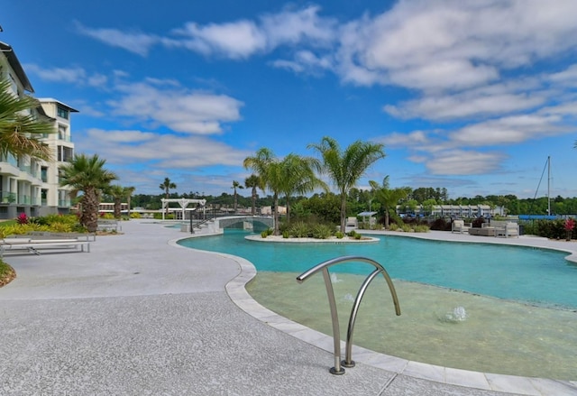 pool with a patio