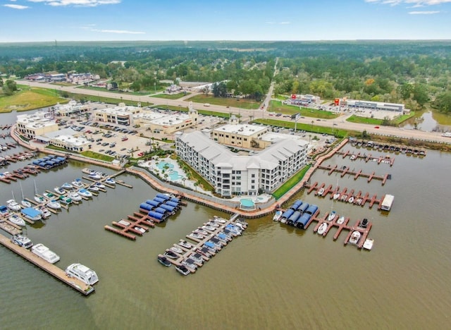 drone / aerial view with a water view