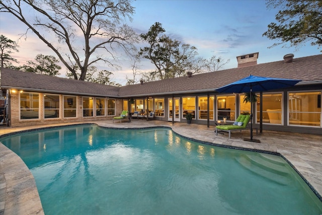 pool featuring a patio area