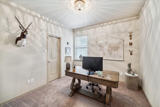 office area featuring carpet flooring and baseboards