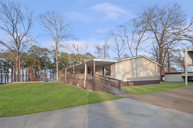 exterior space featuring a lawn and covered porch