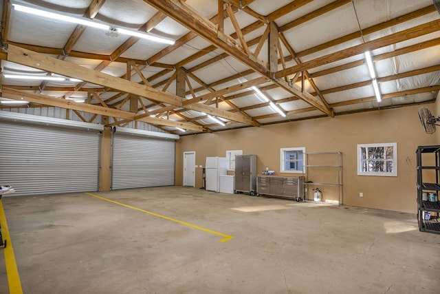 garage featuring freestanding refrigerator