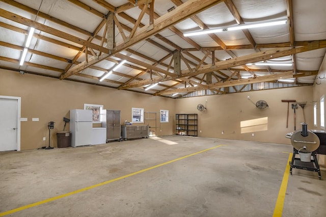 garage with freestanding refrigerator