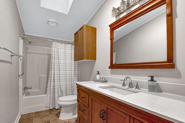 bathroom featuring shower / bathtub combination with curtain, toilet, a skylight, tile patterned flooring, and vanity