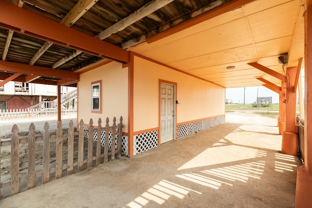 view of patio featuring fence