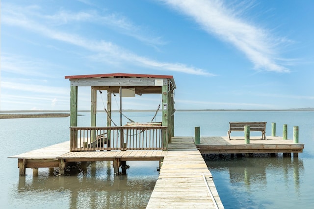 view of dock with a water view