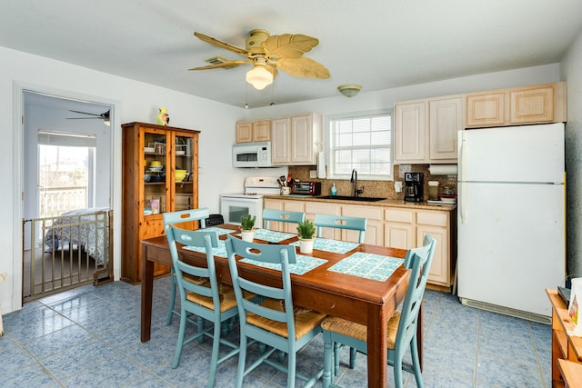 dining room featuring a ceiling fan