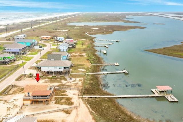 drone / aerial view with a water view