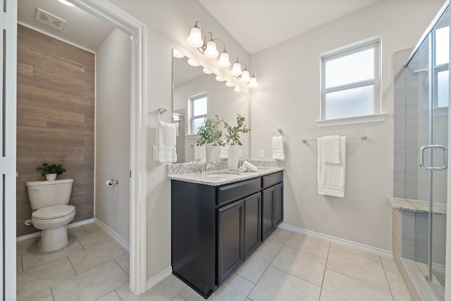 full bathroom featuring tile patterned flooring, visible vents, a stall shower, and toilet