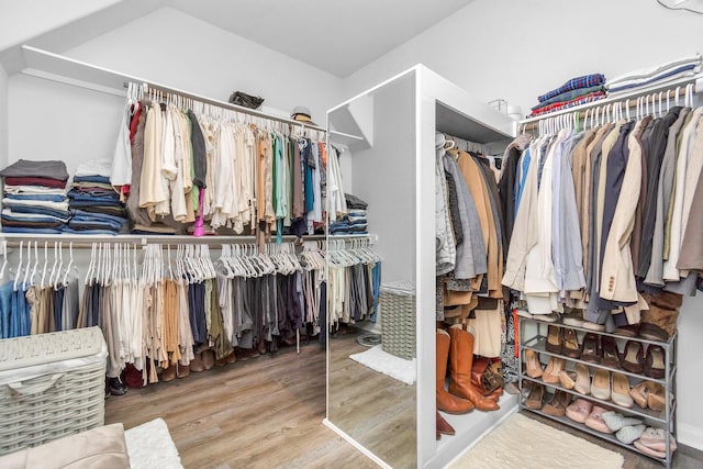 spacious closet with wood finished floors