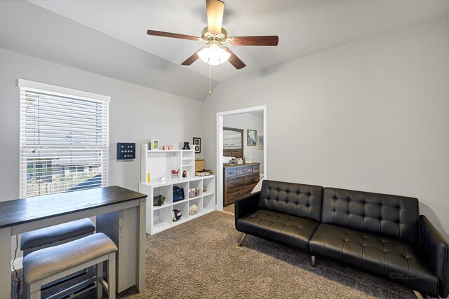 interior space with carpet, a ceiling fan, and vaulted ceiling