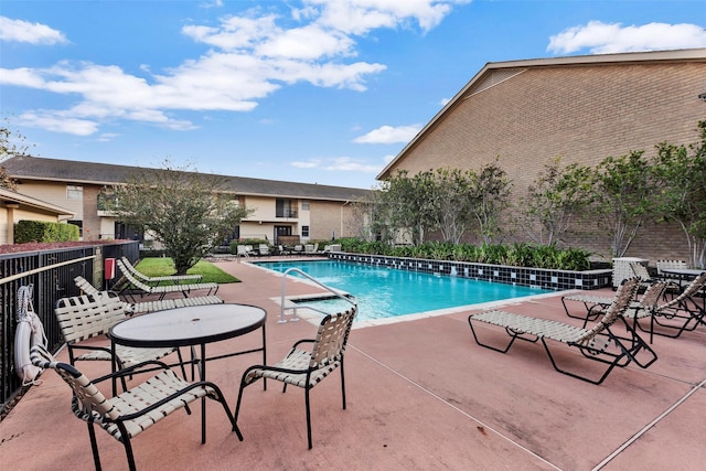 pool with a patio