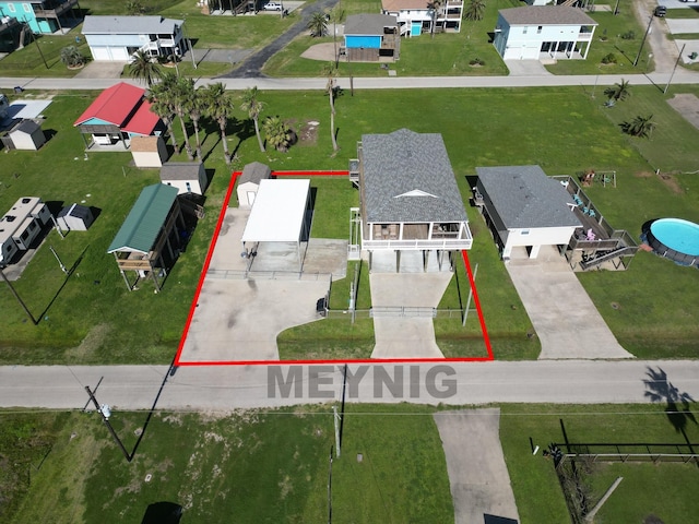aerial view of residential area with property boundaries highlighted