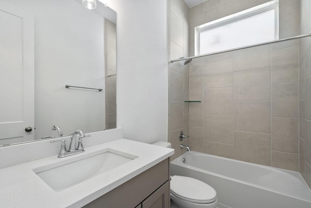 full bath featuring shower / bath combination, toilet, and vanity